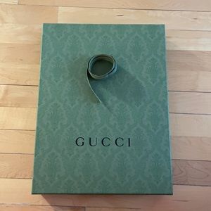 Brand new authentic Gucci box with original ribbon